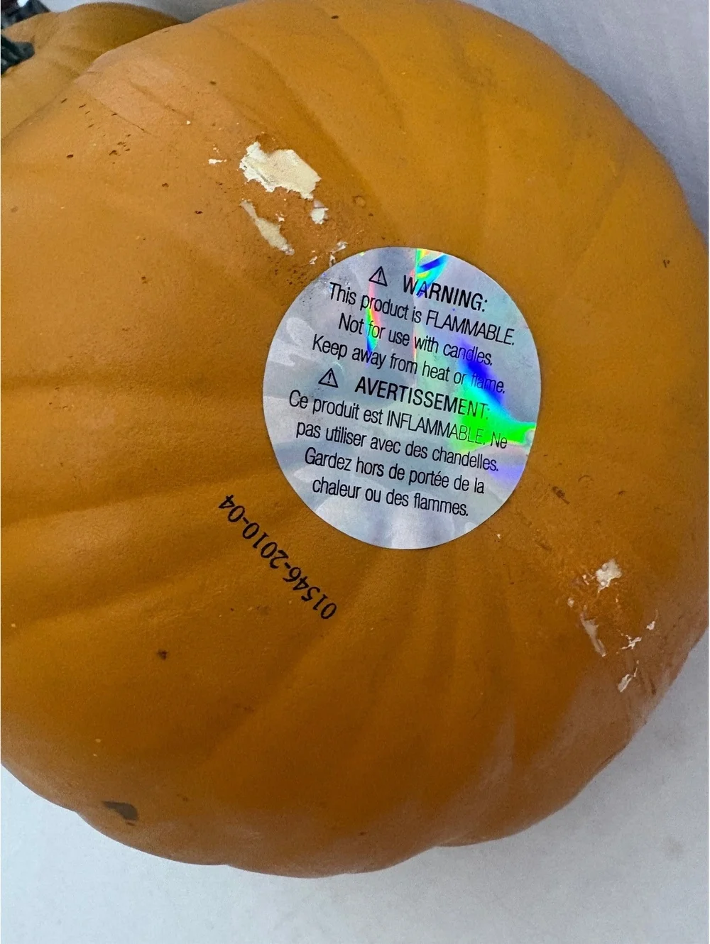 2 fake pumpkins